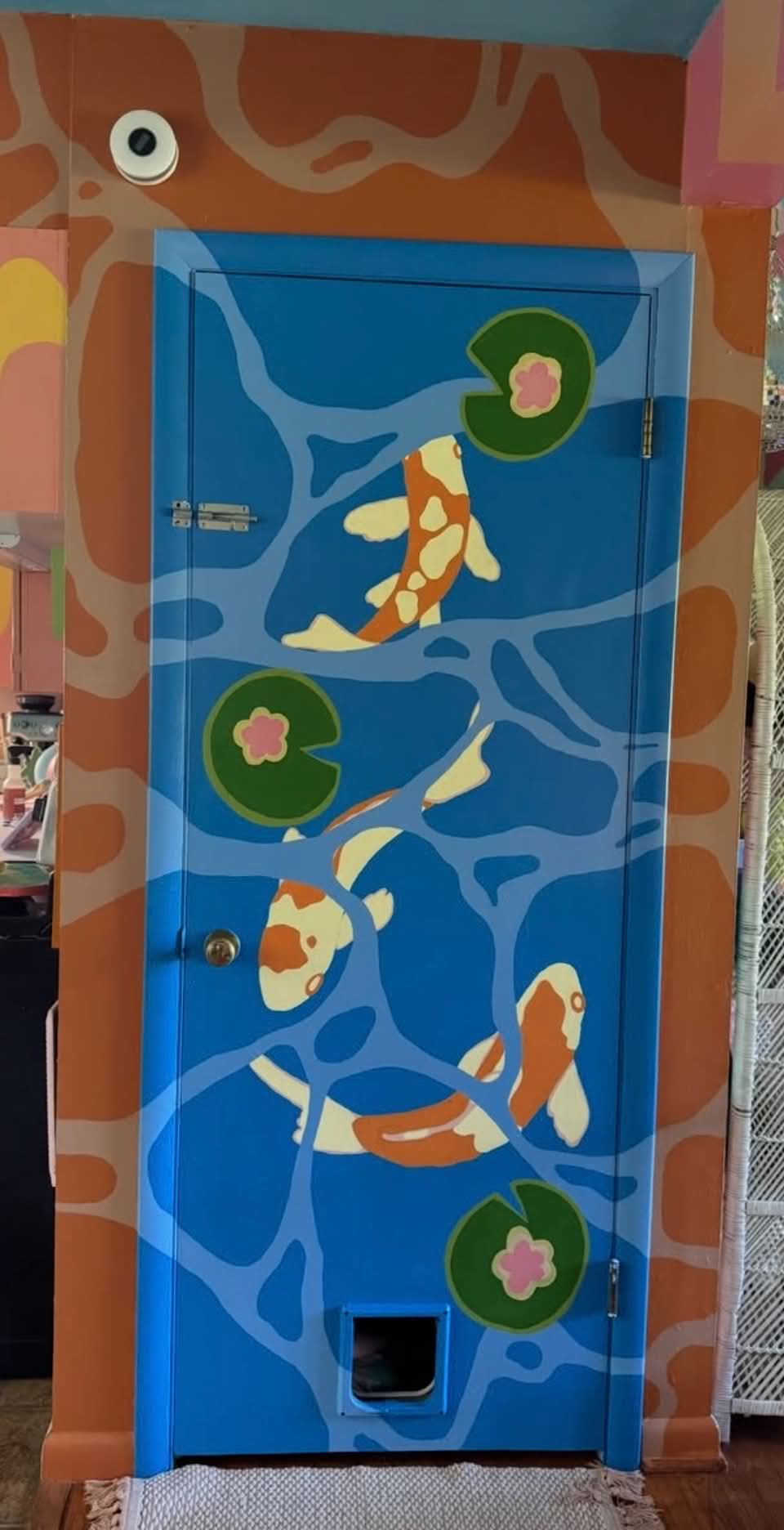 Koi pond mural on door